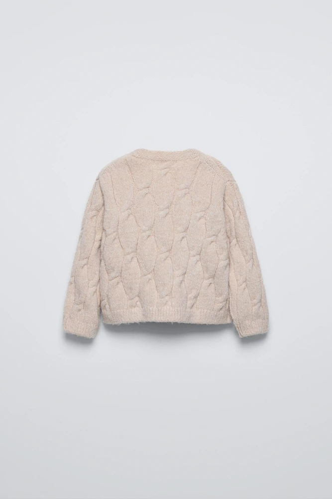 GILET EN MAILLE À TORSADES