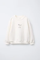 BACK BOW SWEATSHIRT