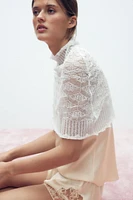 CAPE EN MAILLE TRICOT