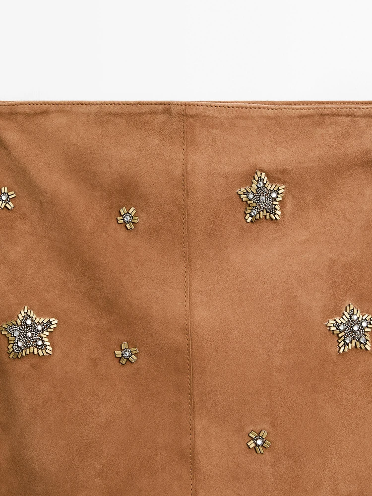 Jupe en cuir et daim avec pierres fantaisie