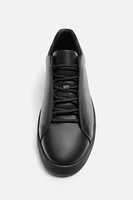 BASKETS EN CUIR