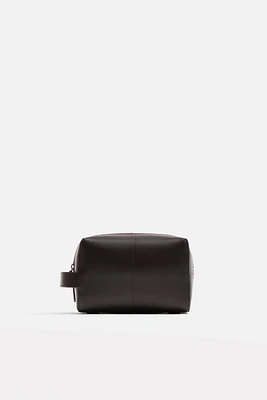 TROUSSE EN CUIR