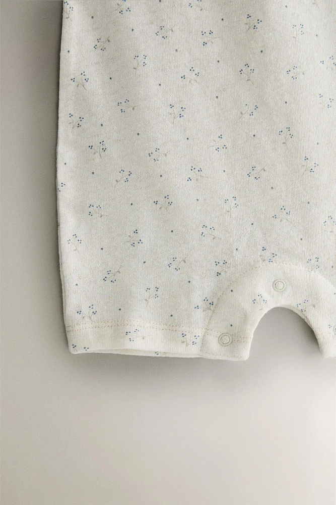 CHILDREN'S FLORAL PRINT FOOTED ROMPER