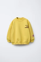 PATCH PRINT SWEATSHIRT