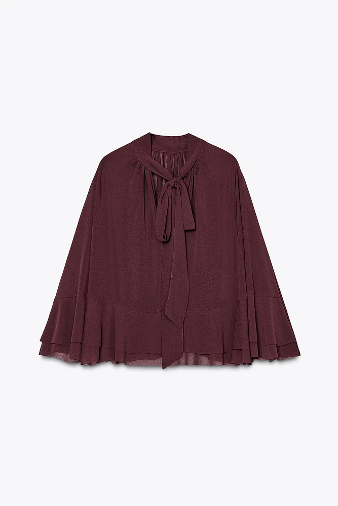 TIE-BACK RUFFLED CAPE