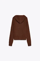GILET EN MAILLE À CAPUCHE
