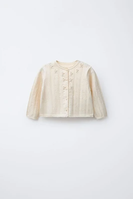 GILET EN MAILLE AJOURÉE ET BRODÉE