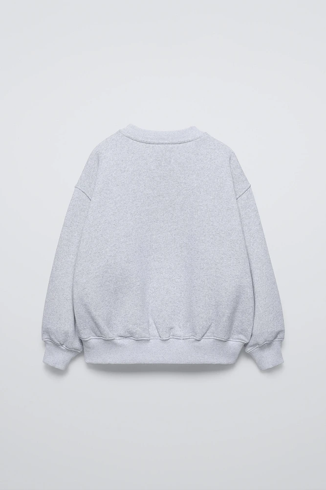 TEXT PRINT FLOCKED SWEATSHIRT