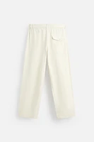 RELAXED FIT PLEATED PANTS