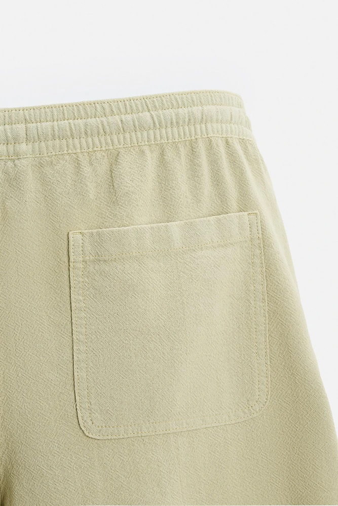TEXTURED EMBROIDERED SHORTS