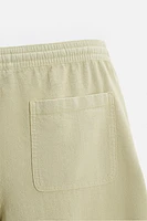 TEXTURED EMBROIDERED SHORTS