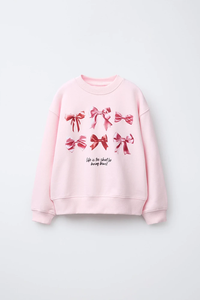 BOW PRINT SWEATSHIRT