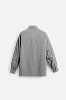 CHEMISE FLUIDE À POCHES UTILITAIRES