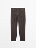 Faded total look linen trousers