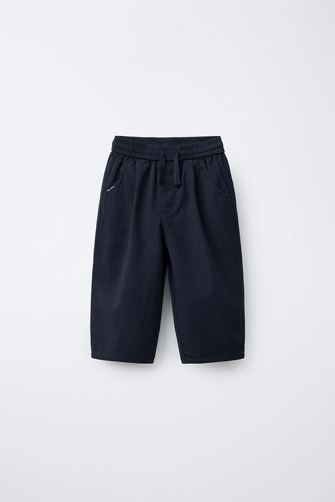 TEXTURED BAGGY PANTS