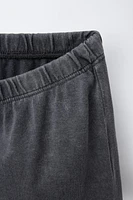 WASHED EFFECT STUDDED BERMUDA SHORTS