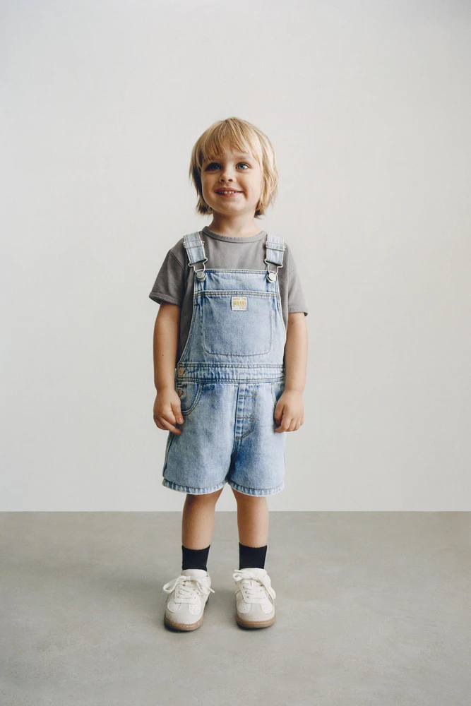 SALOPETTE COURTE EN JEAN
