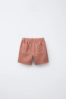BERMUDA STANDARD TOUCHER DOUX