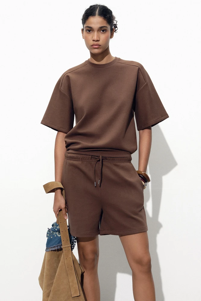 SHORT SLEEVE INTERLOCK SWEATSHIRT