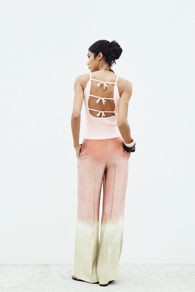 TIE CUT OUT KNIT TOP