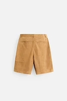 PLEATED SUEDE SHORTS