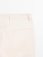 Cotton blend tapered fit denim trousers