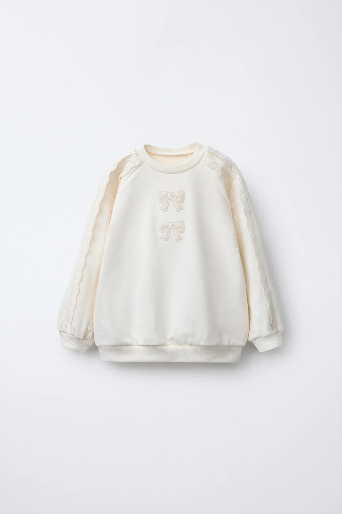 ROMANTIC BOW SWEATSHIRT