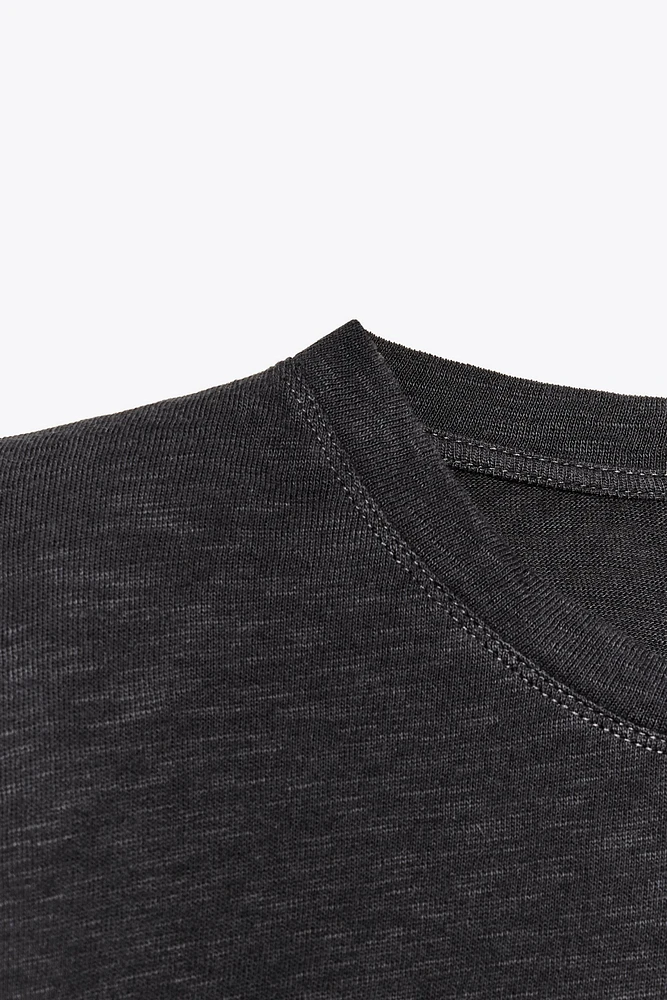 WASHED EFFECT T-SHIRT WITH SHOULDER PADS