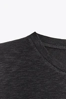 WASHED EFFECT T-SHIRT WITH SHOULDER PADS