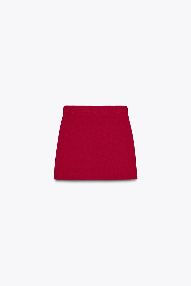 MINI-JUPE EN MAILLE AVEC CEINTURE