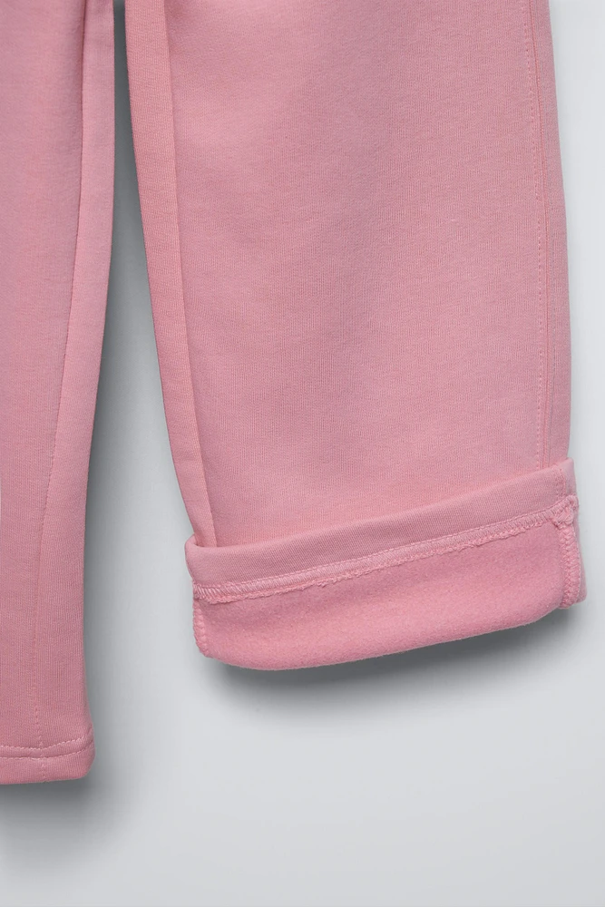 PANTALON À JAMBES LARGES EN MOLLETON AVEC INSCRIPTION