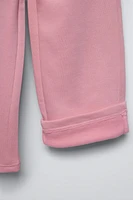 PANTALON À JAMBES LARGES EN MOLLETON AVEC INSCRIPTION
