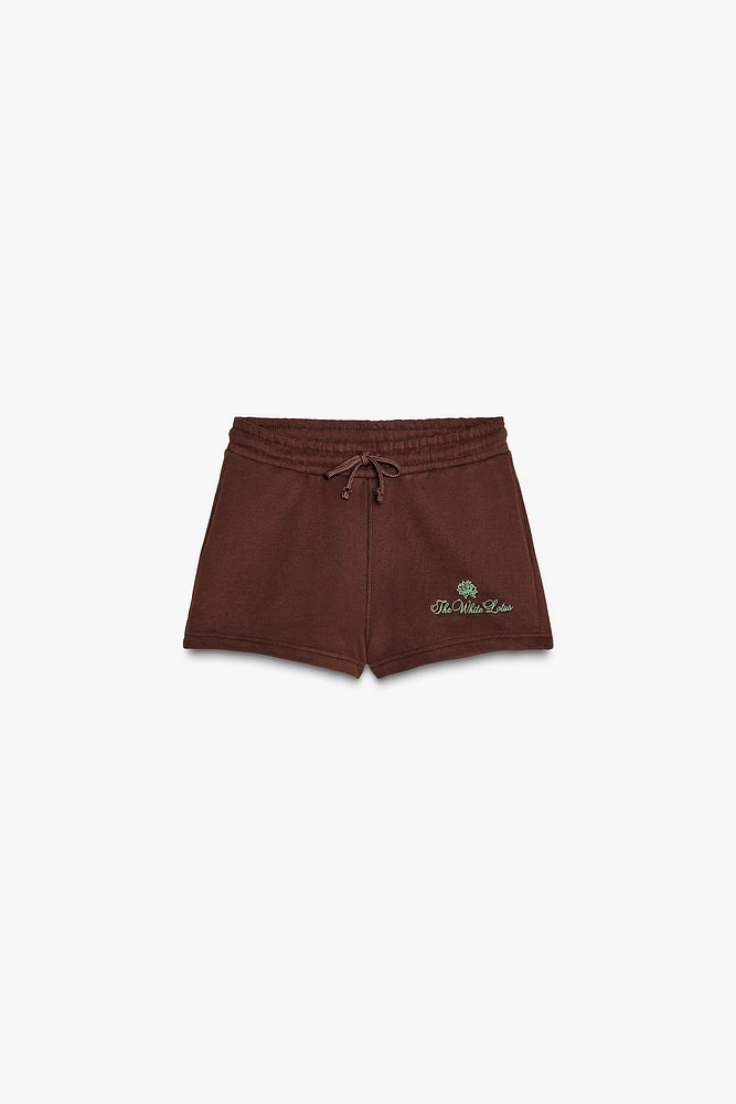 THE WHITE LOTUS FLEECE SHORTS