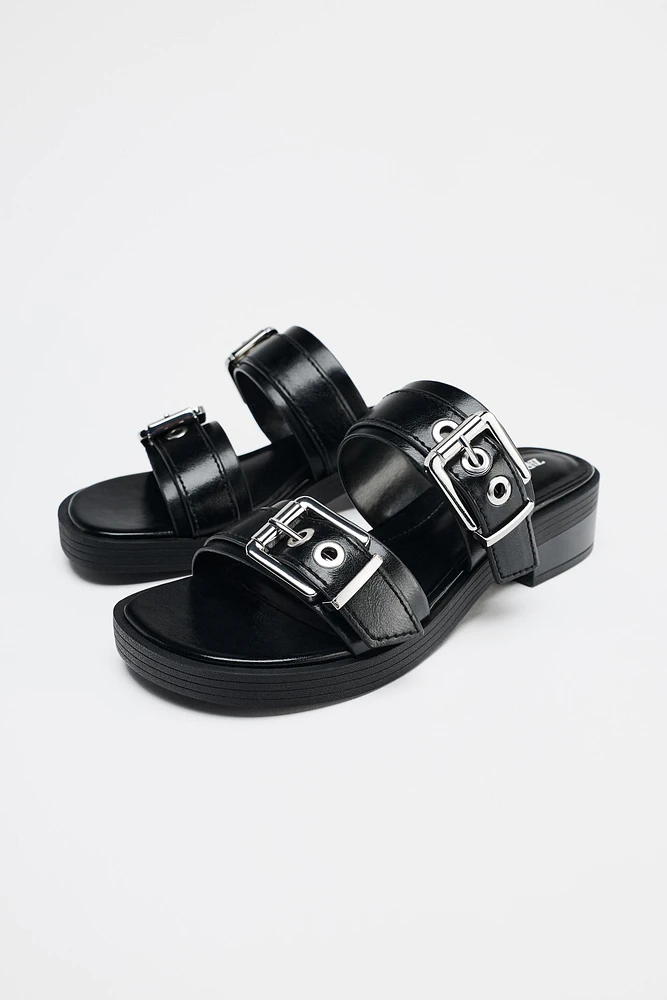 FLAT BUCKLED SANDALS
