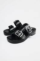 FLAT BUCKLED SANDALS