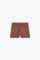 SHORTS SATINÉS AVEC DENTELLE