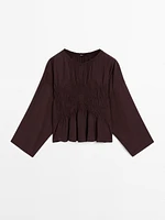 Flowing blouse with gathered detail