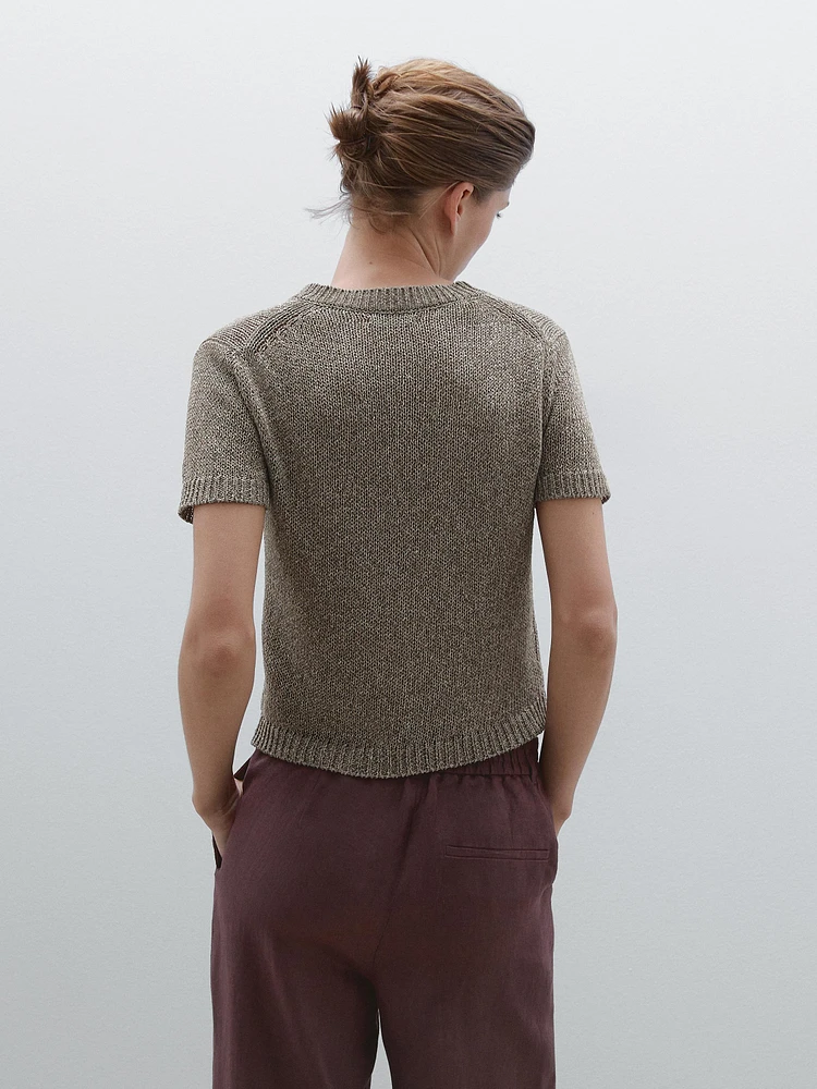 Knit sweater with fabric detail