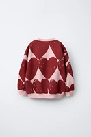 HEART PRINT SWEATSHIRT