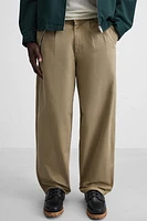 PANTALON RELAXED FIT À PLIS
