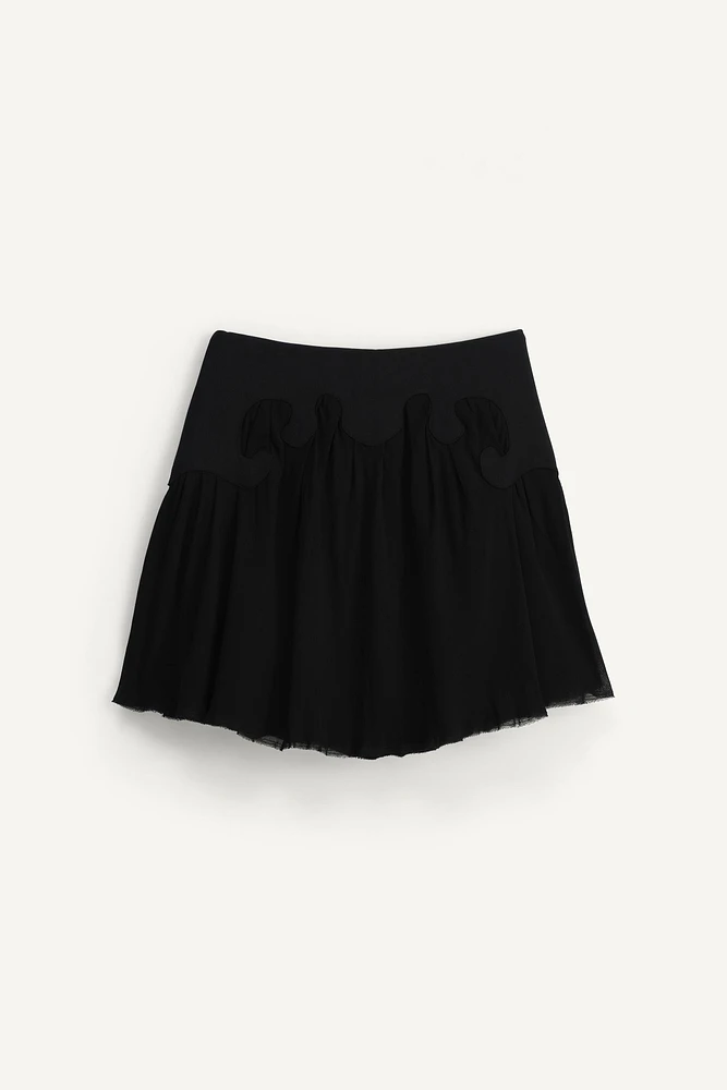 LIMITED EDITION COMBINATION SHORT SKIRT