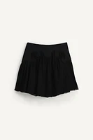 LIMITED EDITION COMBINATION SHORT SKIRT