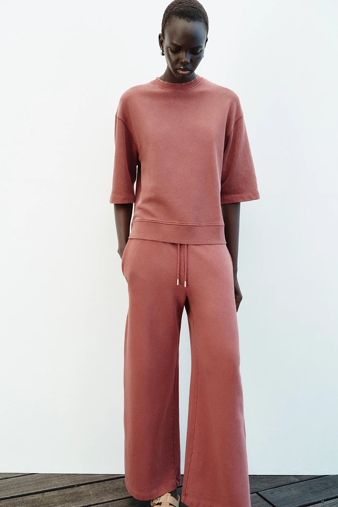 WASHED EFFECT WIDE LEG PANTS