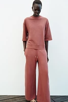 WASHED EFFECT WIDE LEG PANTS