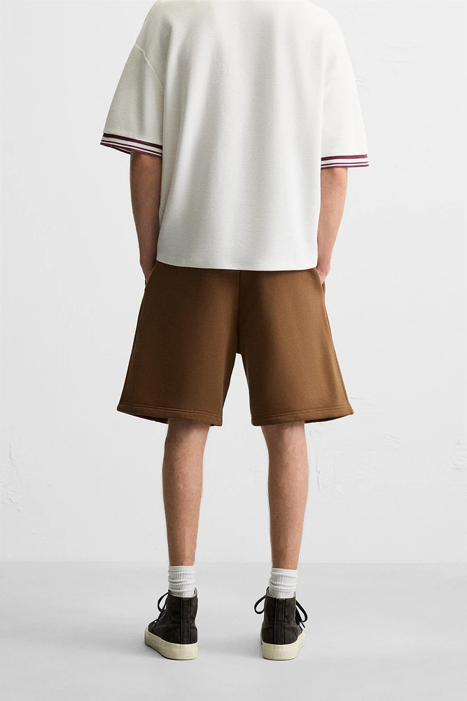 BERMUDA DE JOGGING COUTURES