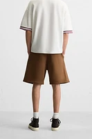 BERMUDA DE JOGGING COUTURES