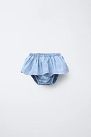 EMBROIDERED RUFFLE DENIM BOTTOMS