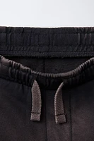 WORN EFFECT PLUSH SHORTS