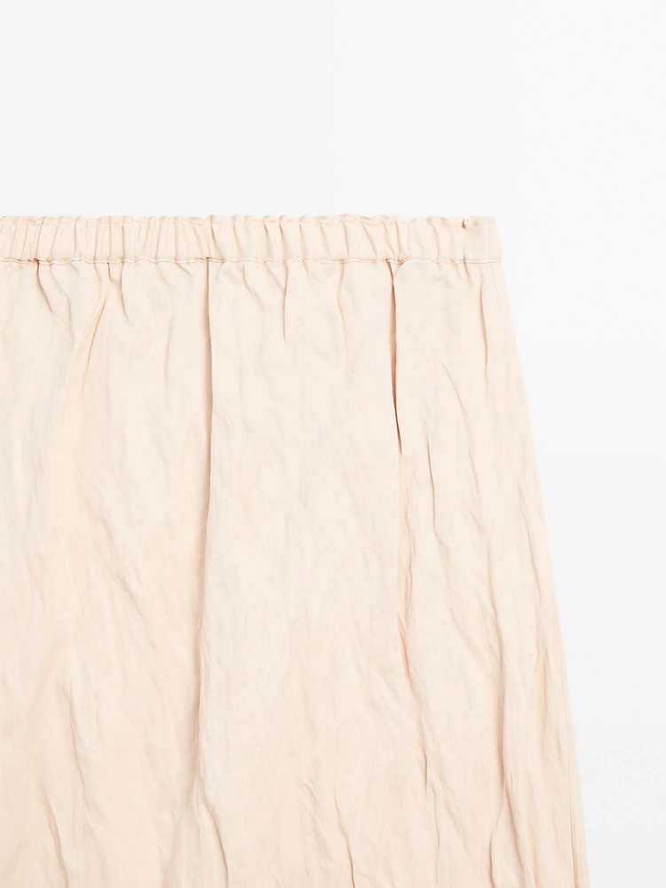 Jupe midi fluide à dentelle