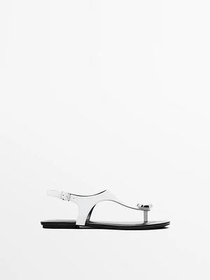 Flat leather sandals with embellished detail